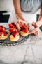 tartlet bakery made fresh with vanilla custard sweet pastry tart fruit strawberries blueberries and pistachios