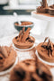 chocolate baked cocoa dusted tart ready for garnishing made fresh by tartlet bakery