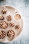 ferrero ocher inspired tart made from chocolate shortcrust pastry, hazelnut praline, chocolate mud cake, whipped nutella ganache and roasted hazelnuts made fresh by tartlet bakery
