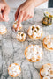 Italian passionfruit meringue tart topped with fresh passionfruit pulp made fresh by tartlet bakery